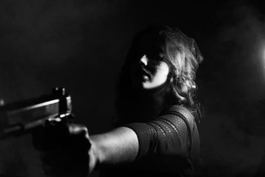 woman with gun